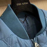 Close-up detail shot of Louis Vuitton luxury clothing with logo-detail design