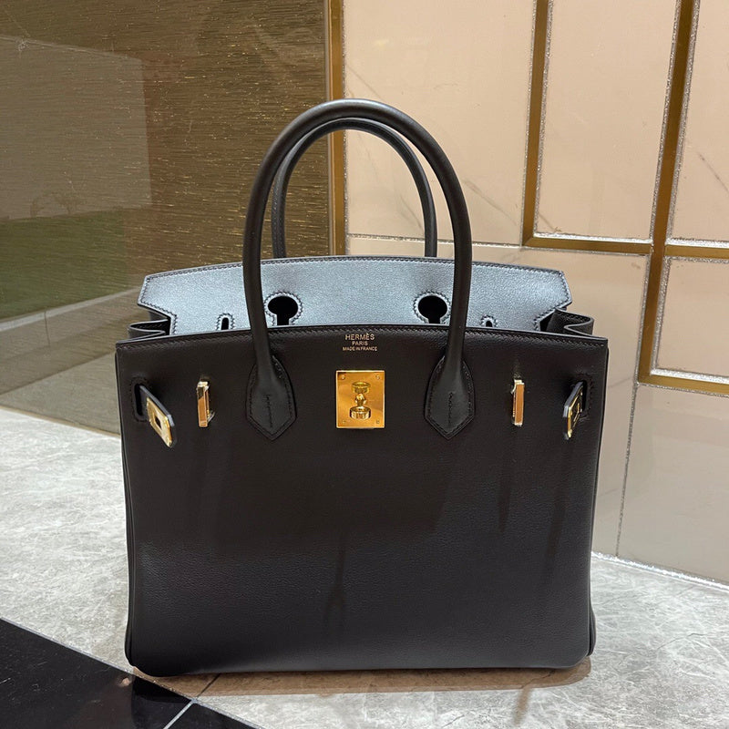Side view of smart structured handbag