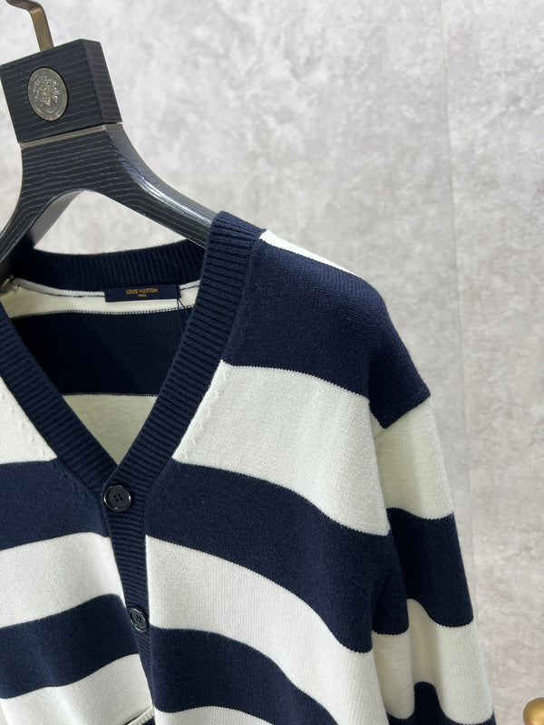Full styled look of Louis Vuitton luxury clothing with label-forward styling