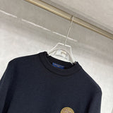 Front view of Louis Vuitton luxury clothing with contemporary cut