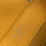 Side profile of signature classic women's handbag – women's statement bag