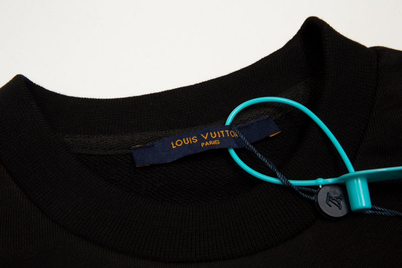 Full styled look of Louis Vuitton luxury clothing with monogram-inspired silhouette