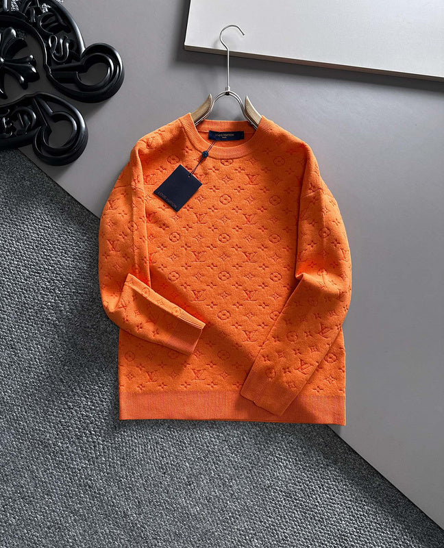 Close-up detail shot of Louis Vuitton luxury clothing with logo-detail design