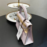 Side view of tailored structured handbag