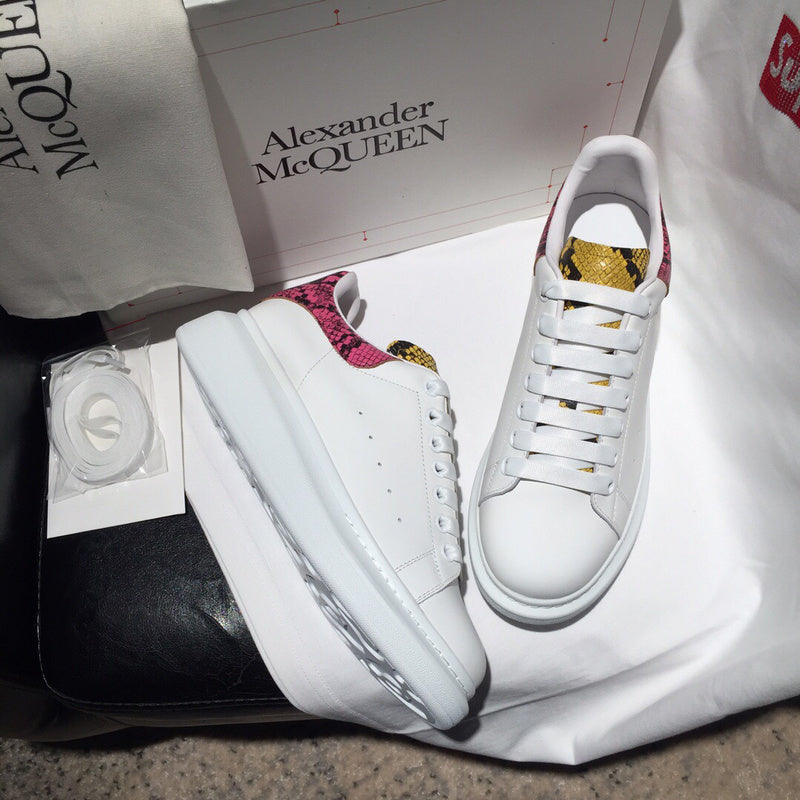 Alexander McQueen fresh white-and-black luxury sneakers view 9 signature lace-up style