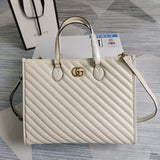 Side profile of chic sleek women's handbag – women's statement bag