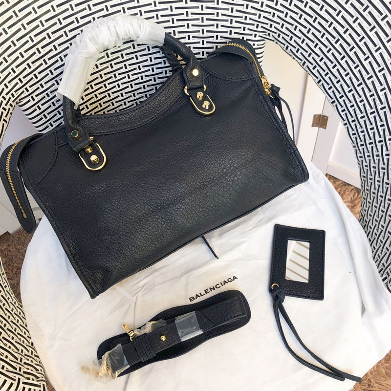 Top view of polished elevated women's handbag – women's luxury accessory