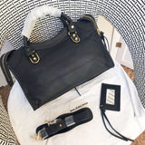 Top view of polished elevated women's handbag – women's luxury accessory
