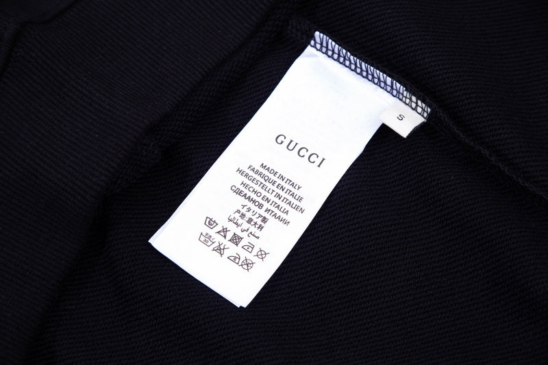 Close-up detail shot of Gucci luxury clothing with everyday silhouette