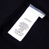 Close-up detail shot of Gucci luxury clothing with everyday silhouette