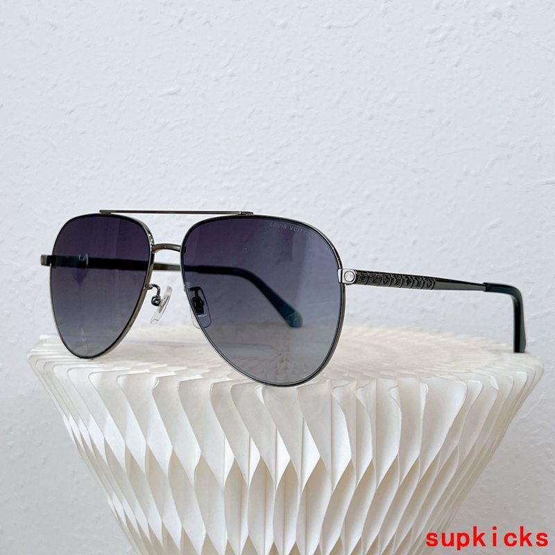 Close-up detail view of Louis Vuitton unisex sunglasses