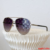 Close-up detail view of Louis Vuitton unisex sunglasses