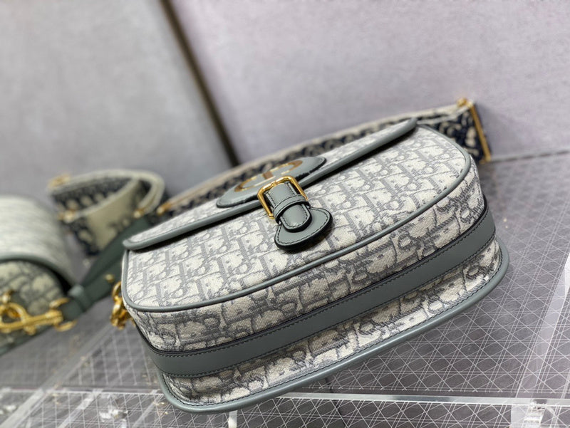 Handle and strap detail of everyday-luxe polished women's handbag – women's designer-style accessory