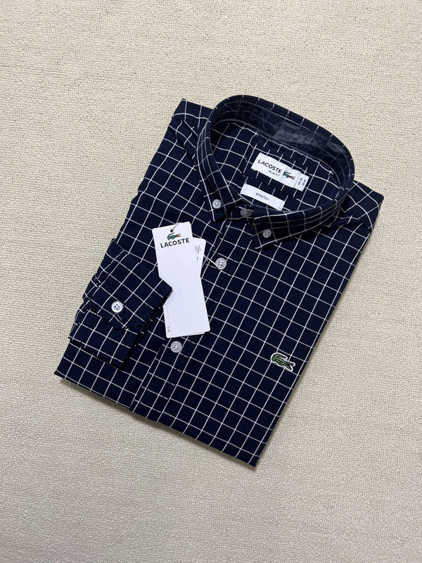 Side profile of Lacoste luxury clothing with monogram-inspired silhouette