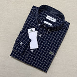 Side profile of Lacoste luxury clothing with monogram-inspired silhouette