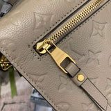 Top view of classic signature women's handbag – women's luxury accessory