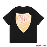Close-up detail shot of Rhude luxury clothing with monogram-inspired silhouette
