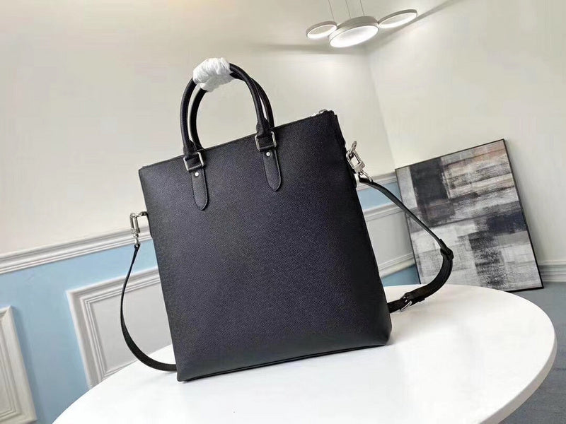 Back view of structured sleek women's handbag – women's statement bag