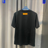 Flat lay presentation of Louis Vuitton cotton t-shirt with tailored silhouette
