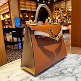 Side view of minimalist structured handbag