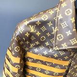 Close-up detail shot of Louis Vuitton luxury clothing with runway-inspired design
