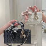 Back view of elevated modern women's handbag – women's luxury accessory