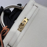 Side view of tailored structured handbag