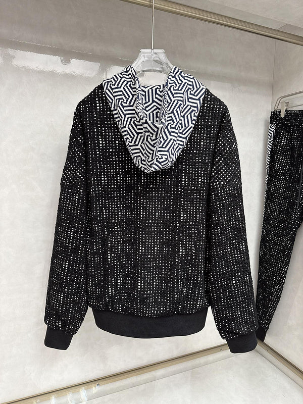 Flat lay presentation of Louis Vuitton luxury clothing with everyday silhouette