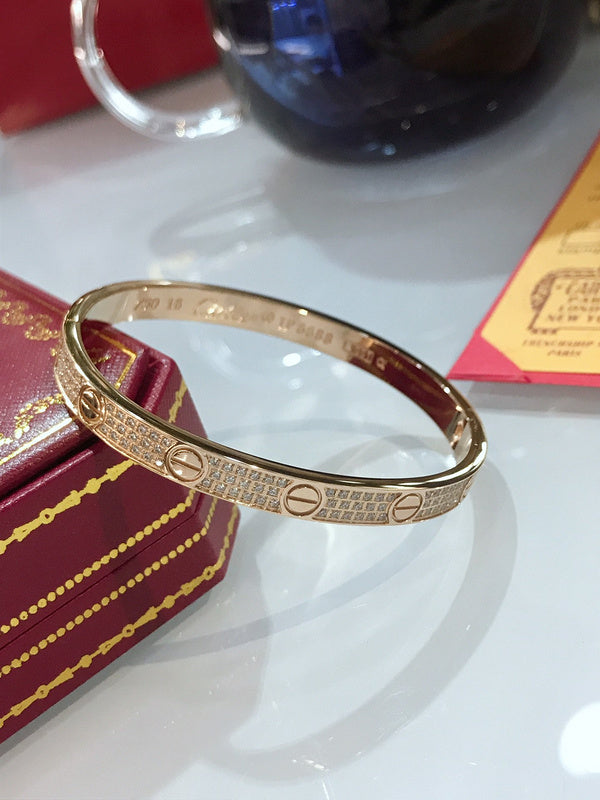 Close-up detail view of Cartier unisex jewelry piece