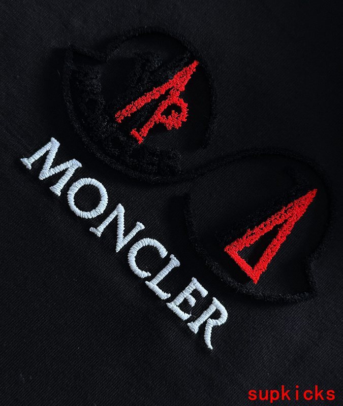Close-up detail shot of Moncler luxury clothing with everyday silhouette