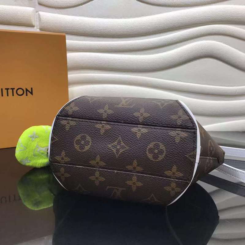Styled lifestyle shot of signature everyday-luxe women's handbag – women's luxury handbag