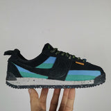 Nike tonal black luxury sneakers view 4 chunky sole construction