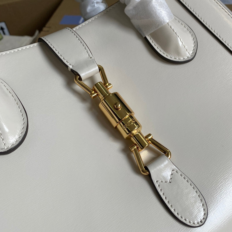 Back view of structured statement women's handbag – women's statement bag