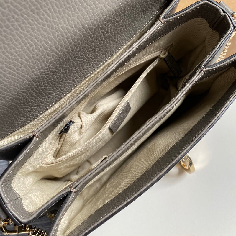 Side profile of chic elevated women's handbag – women's statement bag