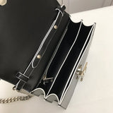 Ziva's Charm handbag – carry view (one versatile size)