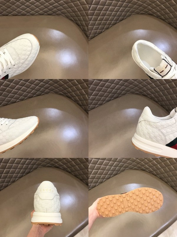 Side profile of Gucci soft grey sneakers bold athletic profile