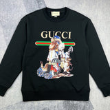 Back view of Gucci luxury clothing with signature branding