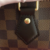 Top view of classic polished women's handbag – women's luxury handbag