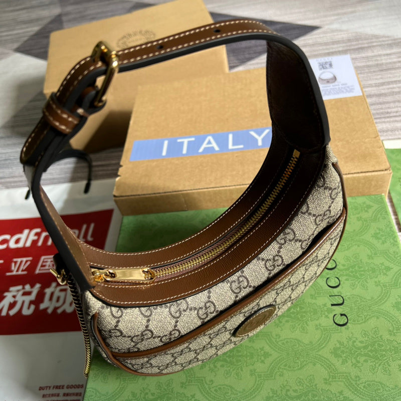 Side view of sleek structured handbag
