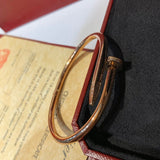 Front view of Cartier unisex jewelry piece