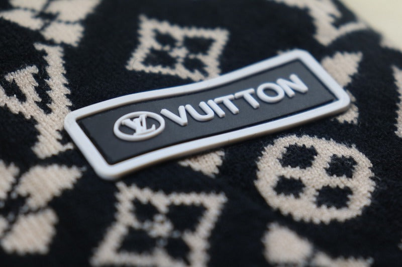 Full styled look of Louis Vuitton luxury clothing with logo-detail design