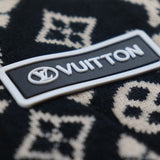 Full styled look of Louis Vuitton luxury clothing with logo-detail design