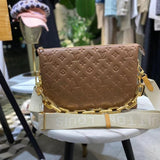 Side profile of structured statement women's handbag – women's luxury accessory