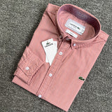 Close-up detail shot of Lacoste luxury clothing with monogram-inspired silhouette