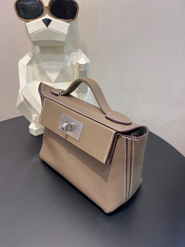  Structured shoulder bag carried on shoulder