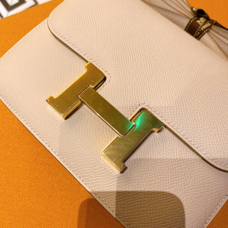 Side view of refined structured handbag