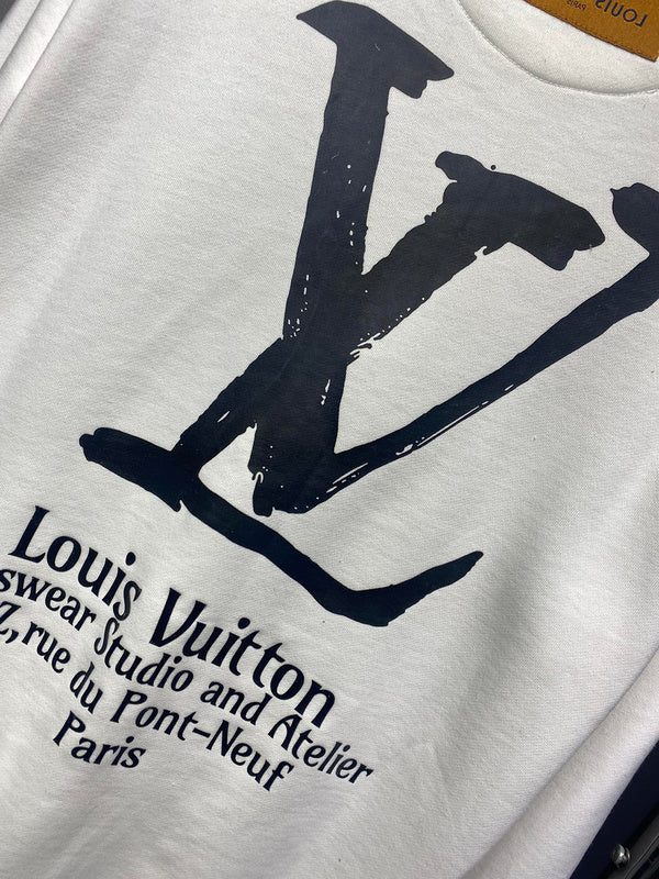 Side profile of Louis Vuitton luxury clothing with runway-inspired design