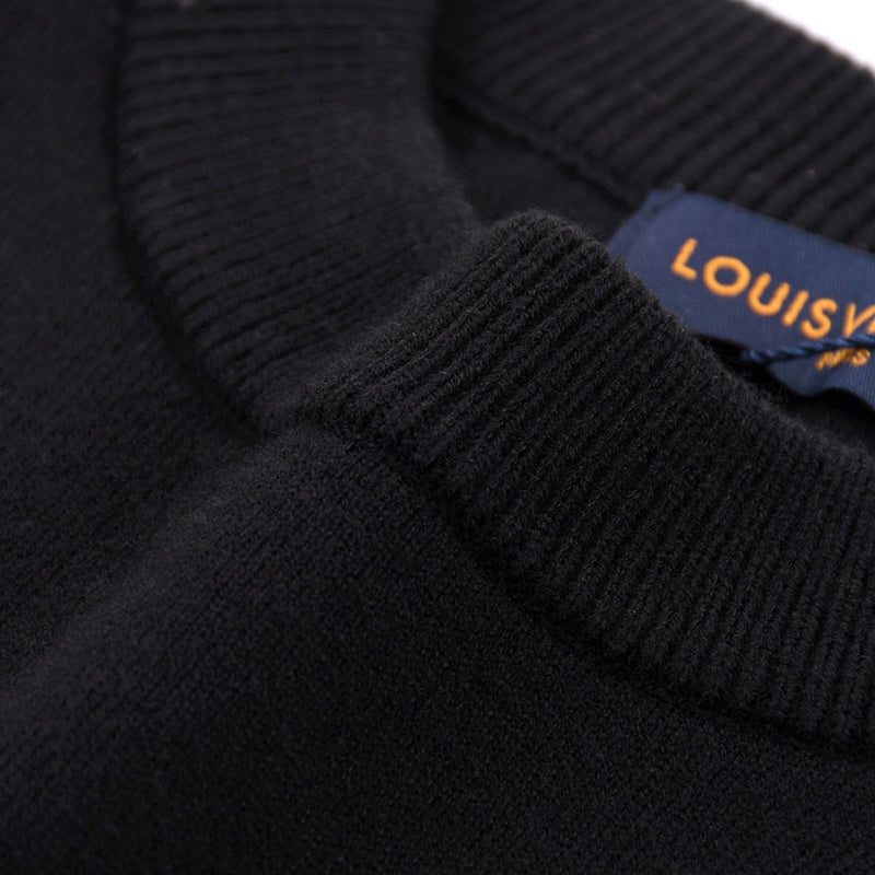 Back view of Louis Vuitton luxury clothing with tailored silhouette