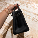 Side view of classic structured handbag