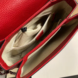 Close-up detail of polished modern women's handbag – women's luxury accessory
